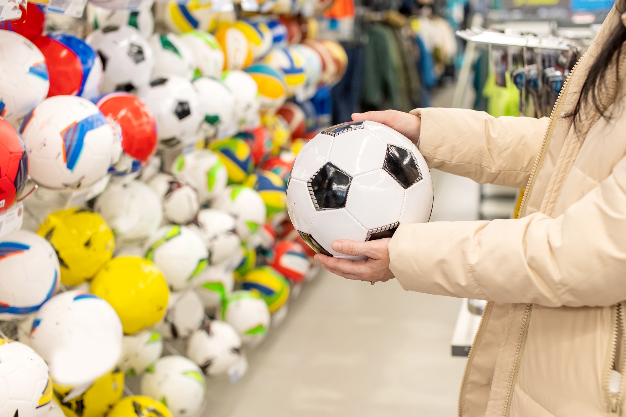 Choose a soccer ball in the store